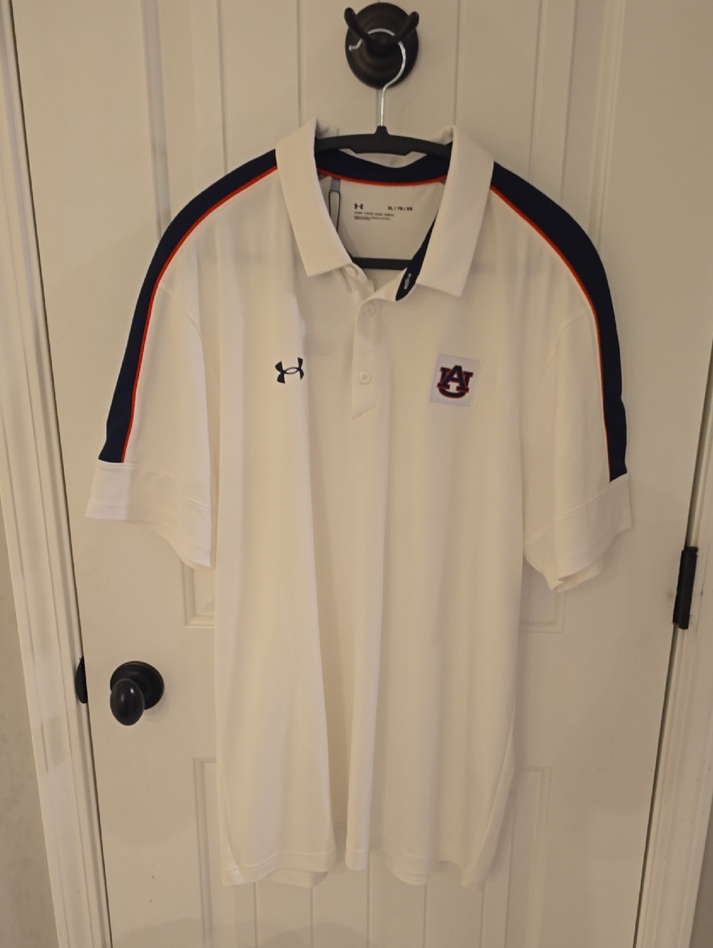 Under Armour White Polo with Navy and Orange Shoulder Stripes